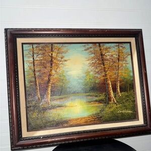 Serene Landscape Painting with Brown Frame